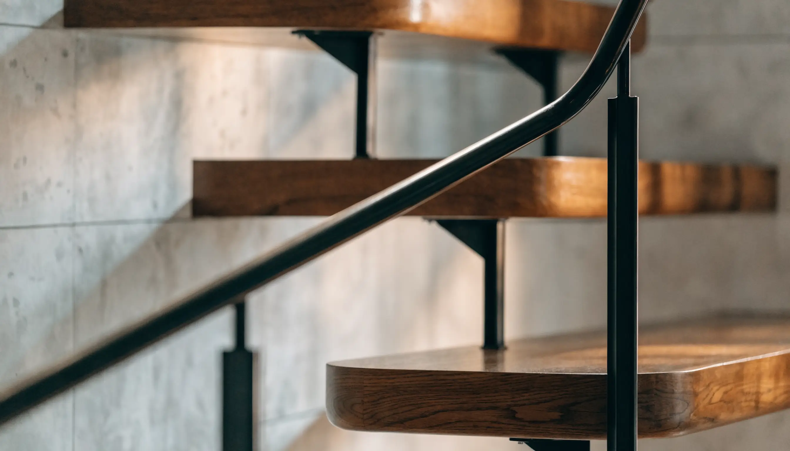 Close-up detail shot of an architectural staircase and railing craftsmanship
